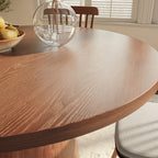 Calen Walnut-Tone Round Wood Pedestal Dining Table with Sculptural Column Base - image 2
